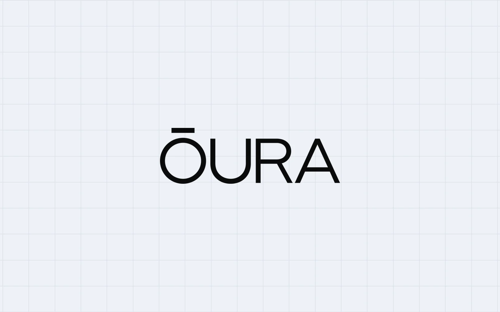 Oura Ring 5 — the ŌURA wordmark on a pale grid