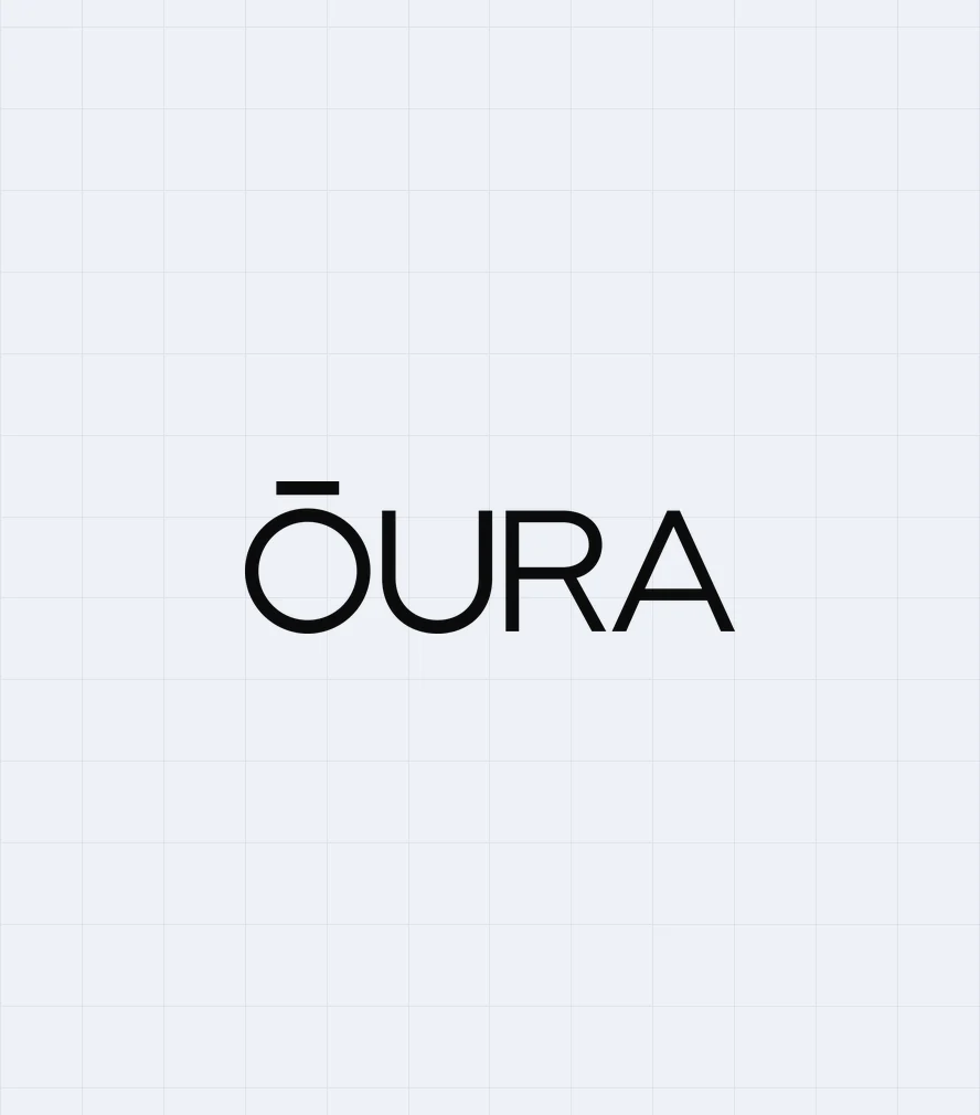 Oura Ring 5 — the ŌURA wordmark on a pale grid