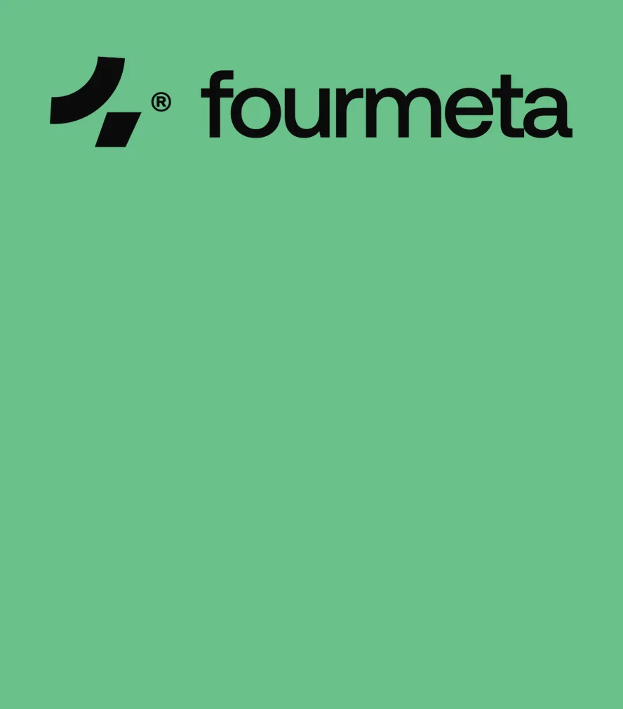 Fourmeta — agency website on a display and a phone